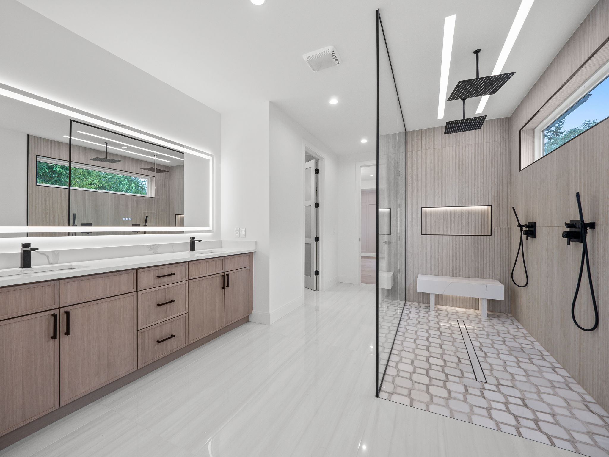 Primary spa bath with walk-in wet room and dual rainfall showers